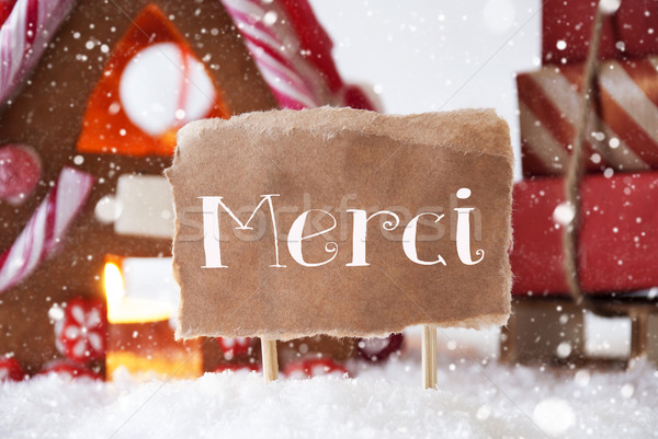 Gingerbread House With Sled, Snowflakes, Merci Means Thank You Stock photo © Nelosa