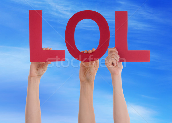 Many People Hands Holding Red Straight Word Lol Blue Sky Stock photo © Nelosa