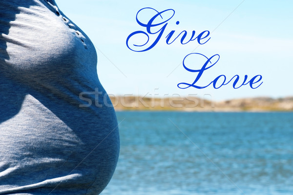 Pregnant Woman Infront Blue Sea With Text Give Love Stock photo © Nelosa