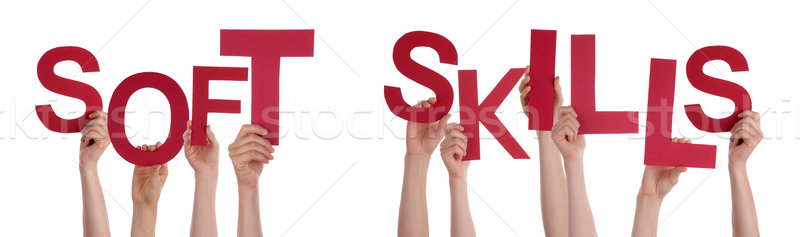 People Hands Holding Red Word Soft Skills Stock photo © Nelosa