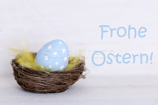 One Blue Easter Egg In Nest With German Frohe Ostern Means Happy Easter Stock photo © Nelosa