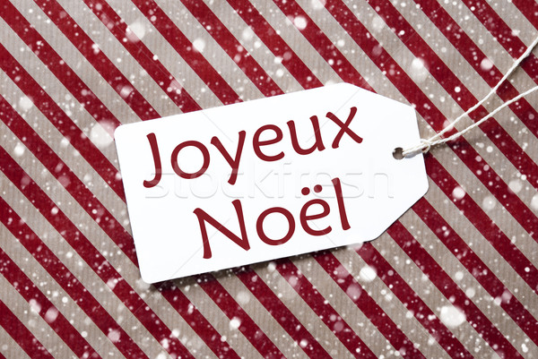 Label On Red Paper, Snowflakes, Joyeux Noel Means Merry Christmas Stock photo © Nelosa