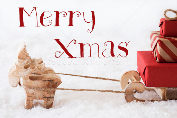 Reindeer With Sled On Snow, Text Merry Xmas Stock photo © Nelosa