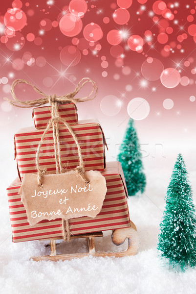 Vertical Christmas Sleigh, Red Background, Bonne Annee Means New Year Stock photo © Nelosa