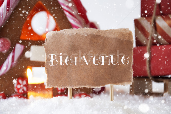 Gingerbread House With Sled, Snowflakes, Bienvenue Means Welcome Stock photo © Nelosa