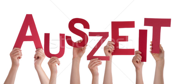 Many People Holding German Word Auszeit Means Downtime Stock photo © Nelosa
