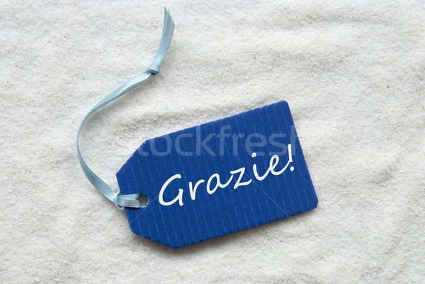 Grazie Means Thank You Blue Label Sand Background Stock photo © Nelosa