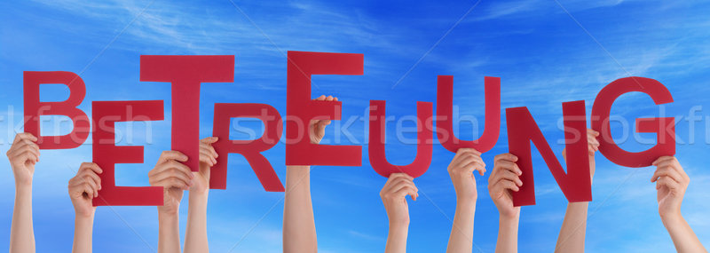 People Hold German Betreuung Means Care Blue Sky Stock photo © Nelosa