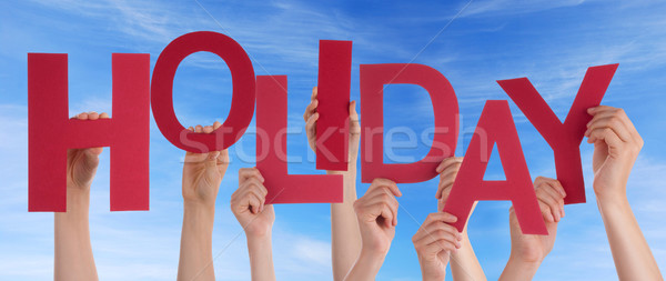 Hands Holding Holiday in the Sky Stock photo © Nelosa