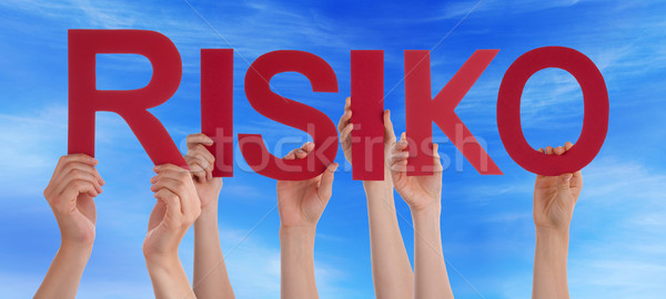 People Hands Holding Straight Word Risiko Means Risk Blue Sky Stock photo © Nelosa