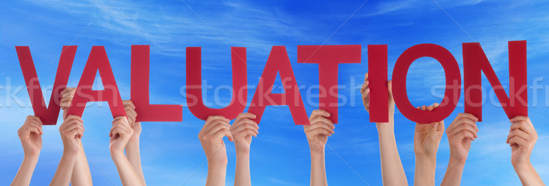 Hands Holding Red Straight Word Valuation Blue Sky Stock photo © Nelosa