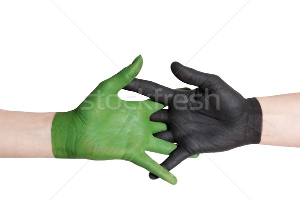 Foto stock: Verde · negro · apretón · de · manos · pintado · mano · aislado