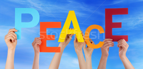 Many People Hands Holding Colorful Word Peace Blue Sky Stock photo © Nelosa