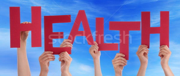 Many People Hands Holding Red Word Health Blue Sky Stock photo © Nelosa