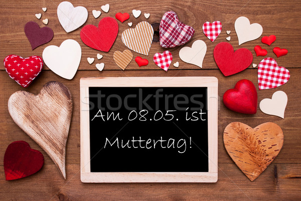 One Chalkbord, Many Red Hearts, Muttertag Mean Mothers Day Stock photo © Nelosa