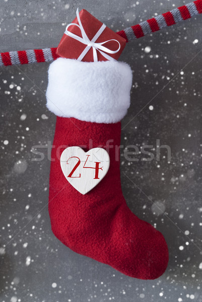 Vertical Boot With Gift, Cement Background, Christmas Eve, Snowflakes Stock photo © Nelosa