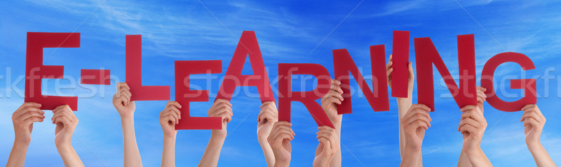 Many People Hands Holding Red Word Elearning Blue Sky Stock photo © Nelosa
