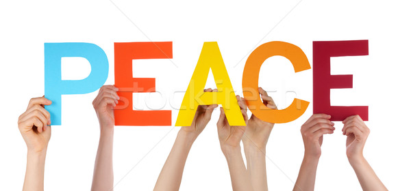 Many People Hands Holding Colorful Straight Word Peace Stock photo © Nelosa