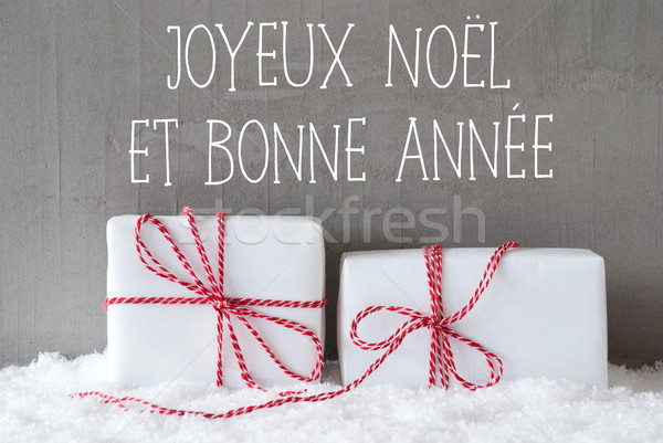 Two Gifts With Snow, Bonne Annee Means Happy New Year Stock photo © Nelosa