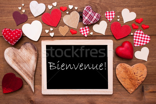 One Chalkbord, Many Red Hearts, Bienvenue Means Welcome Stock photo © Nelosa
