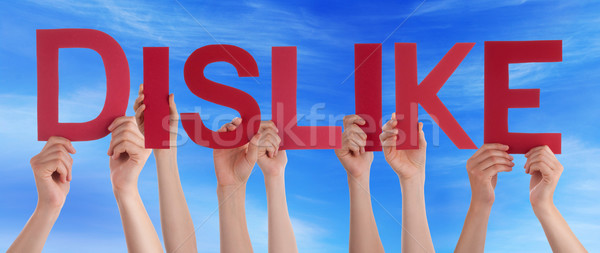 Many People Hands Holding Red Straight Word Dislike Blue Sky Stock photo © Nelosa