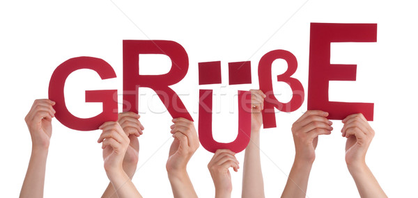 People Holding German Word Gruesse Means Regards Stock photo © Nelosa