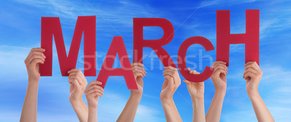 Many People Hands Holding Red Word March Blue Sky Stock photo © Nelosa