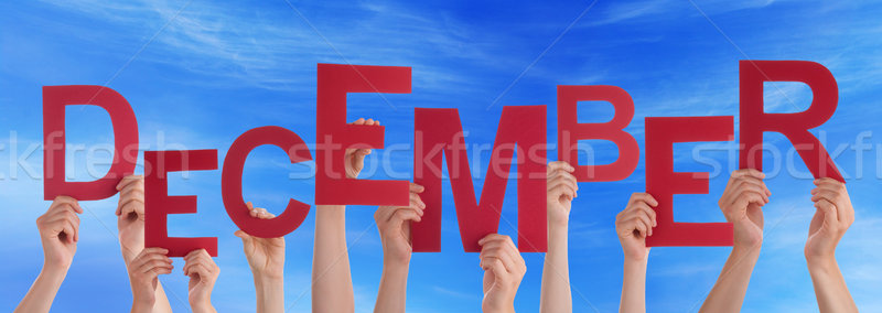 People Hands Holding Red Word December Blue Sky Stock photo © Nelosa