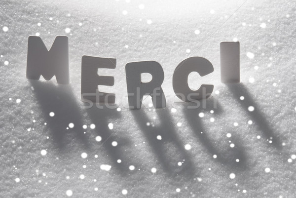 White Word Merci Means Thank You On Snow, Snowflakes Stock photo © Nelosa