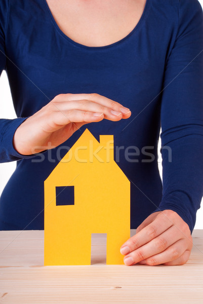 Hands Protecting a House Stock photo © Nelosa