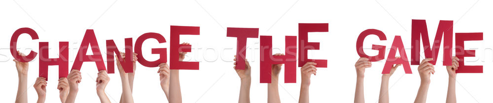 People Hands Holding Red Word Change The Game  Stock photo © Nelosa