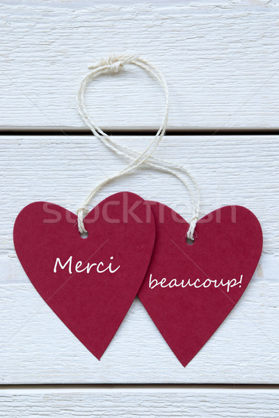 Two Hearts Label With French Merci Beaucoup Means Thank You Vert Stock photo © Nelosa