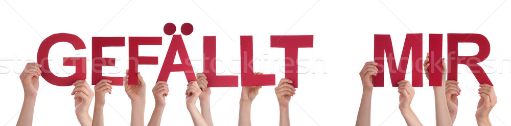 People Holding Red Straight Word Gefaellt Mir Means Like Stock photo © Nelosa
