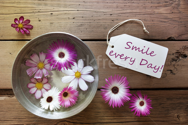 Silver Bowl With Cosmea Blossoms With Life Quote Smile Every Day Stock photo © Nelosa