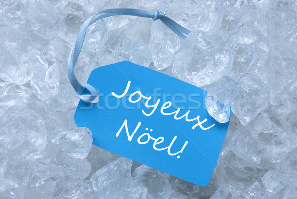 Label On Ice With Joyeux Noel Mean Merry Christmas Stock photo © Nelosa
