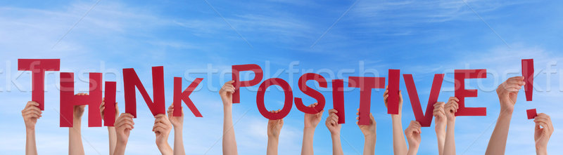 Hands Holding Think Positive in the Sky Stock photo © Nelosa