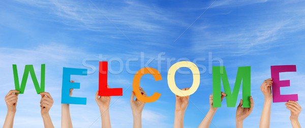 hands holding WELCOME Stock photo © Nelosa