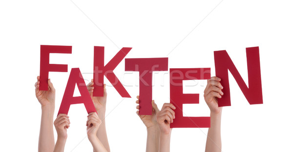People Holding Red German Word Fakten Means Fact Stock photo © Nelosa