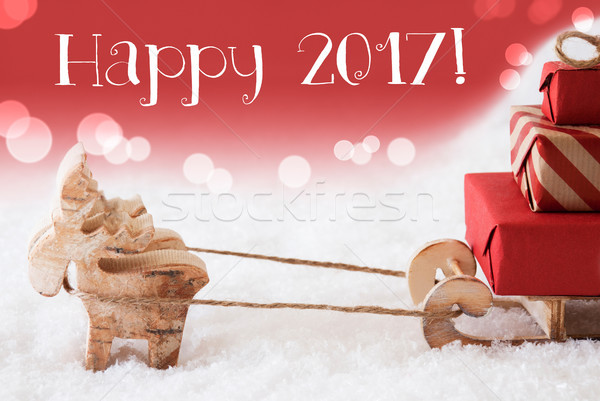 Reindeer With Sled, Red Background, Text Happy 2017 Stock photo © Nelosa