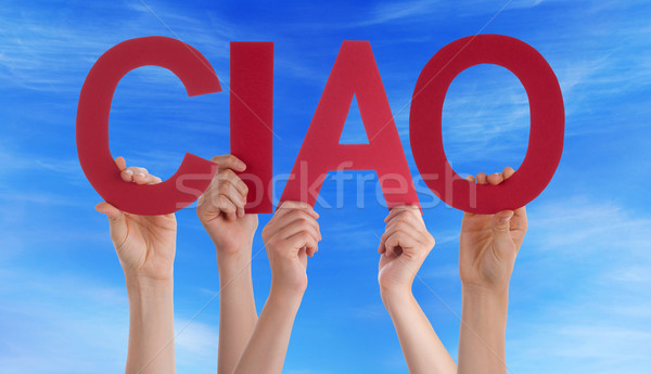 People Holding Straight Italian Word Ciao Means Goodbye Blue Sky Stock photo © Nelosa