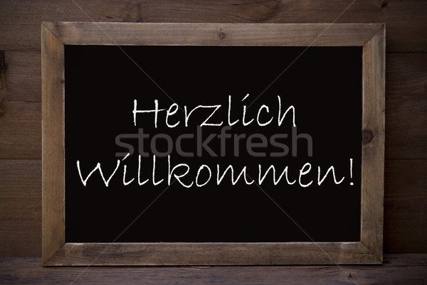 Chalkboard With Herzlich Willkommen Means Welcome Stock photo © Nelosa