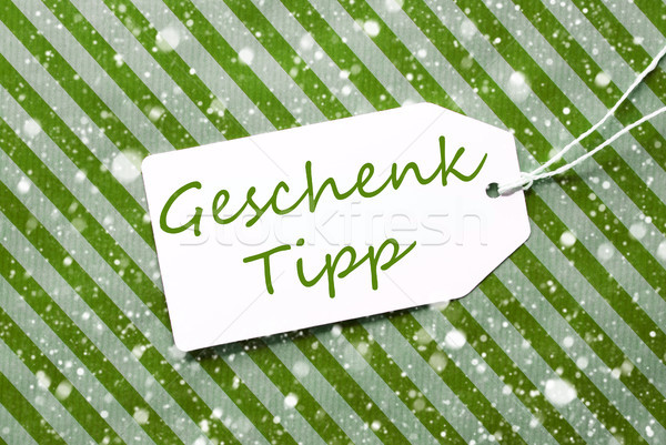 Label, Green Wrapping Paper, Geschenk Tipp Means Gift Tip, Snowflakes Stock photo © Nelosa