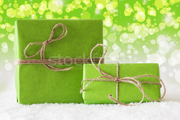 Iki hediyeler kar yeşil bokeh etki Stok fotoğraf © Nelosa
