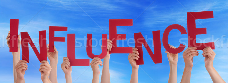 Many People Hands Holding Red Word Influence Blue Sky Stock photo © Nelosa