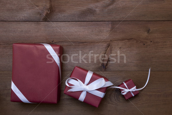 Three Red Christmas Gifts, Presents, White Ribbon, Copy Space Stock photo © Nelosa