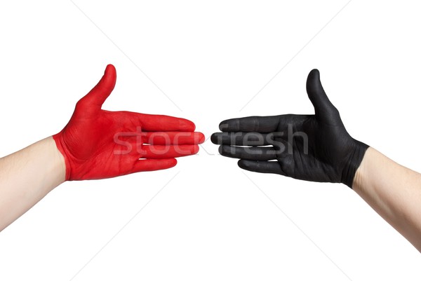 Czerwony czarny handshake malowany strony gest Zdjęcia stock © Nelosa