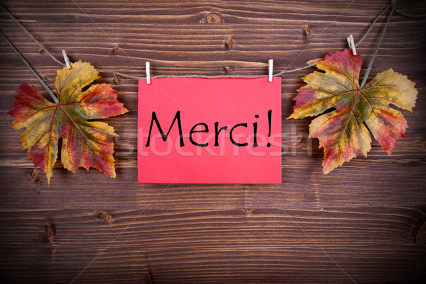 Stock photo: Merci on a Red Label