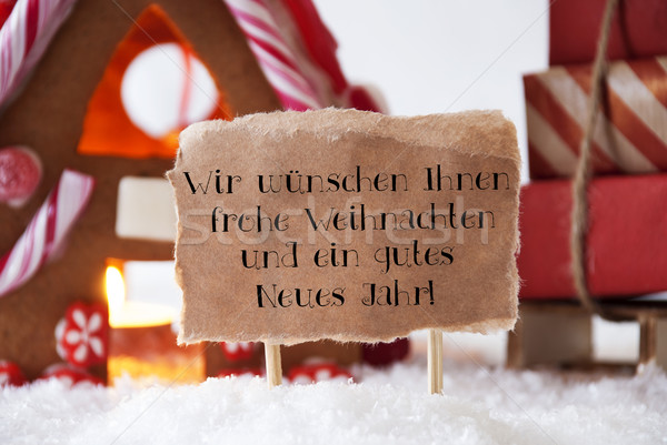 Gingerbread House With Sled, Frohes Neues Jahr Means New Year Stock photo © Nelosa