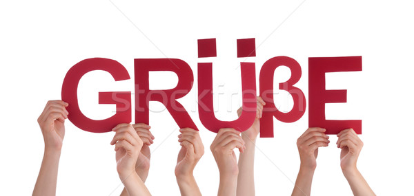People Holding Straight German Word Gruesse Means Regards Stock photo © Nelosa