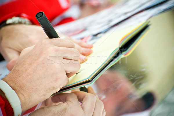 Közelkép ismeretlen sztár aláírás kéz könyv Stock fotó © nelsonart